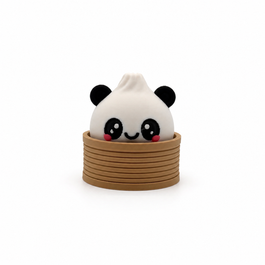 Bao the Panda clicker, a 3D printed panda bao bun fidget clicker sitting in a steam basket
